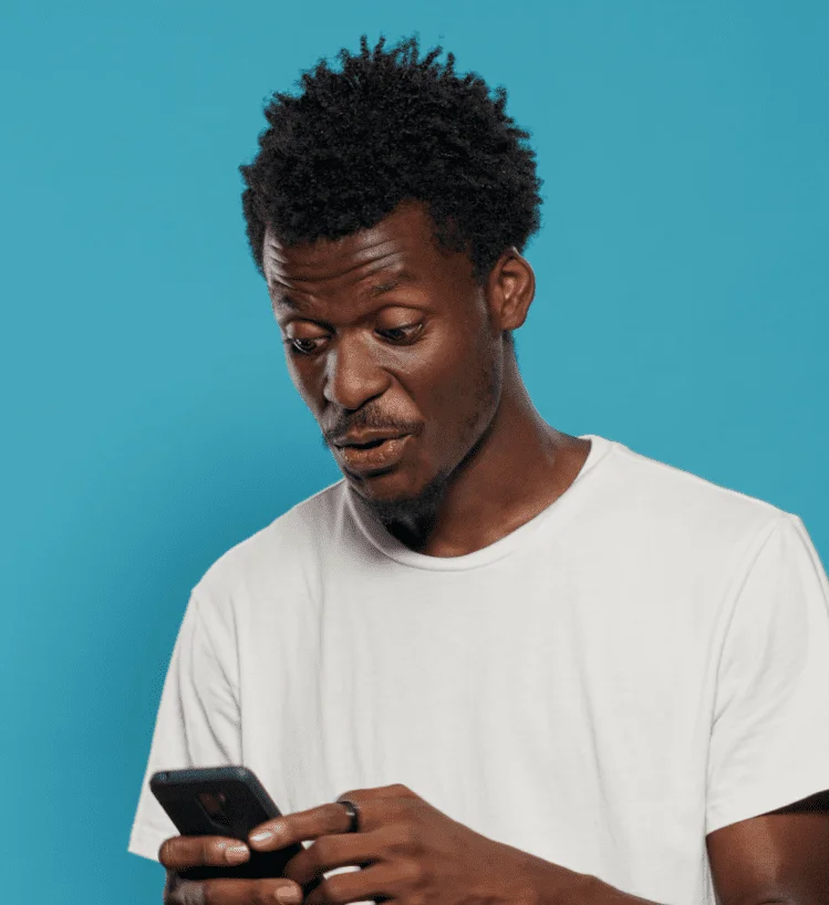 image of a black guy on a phone